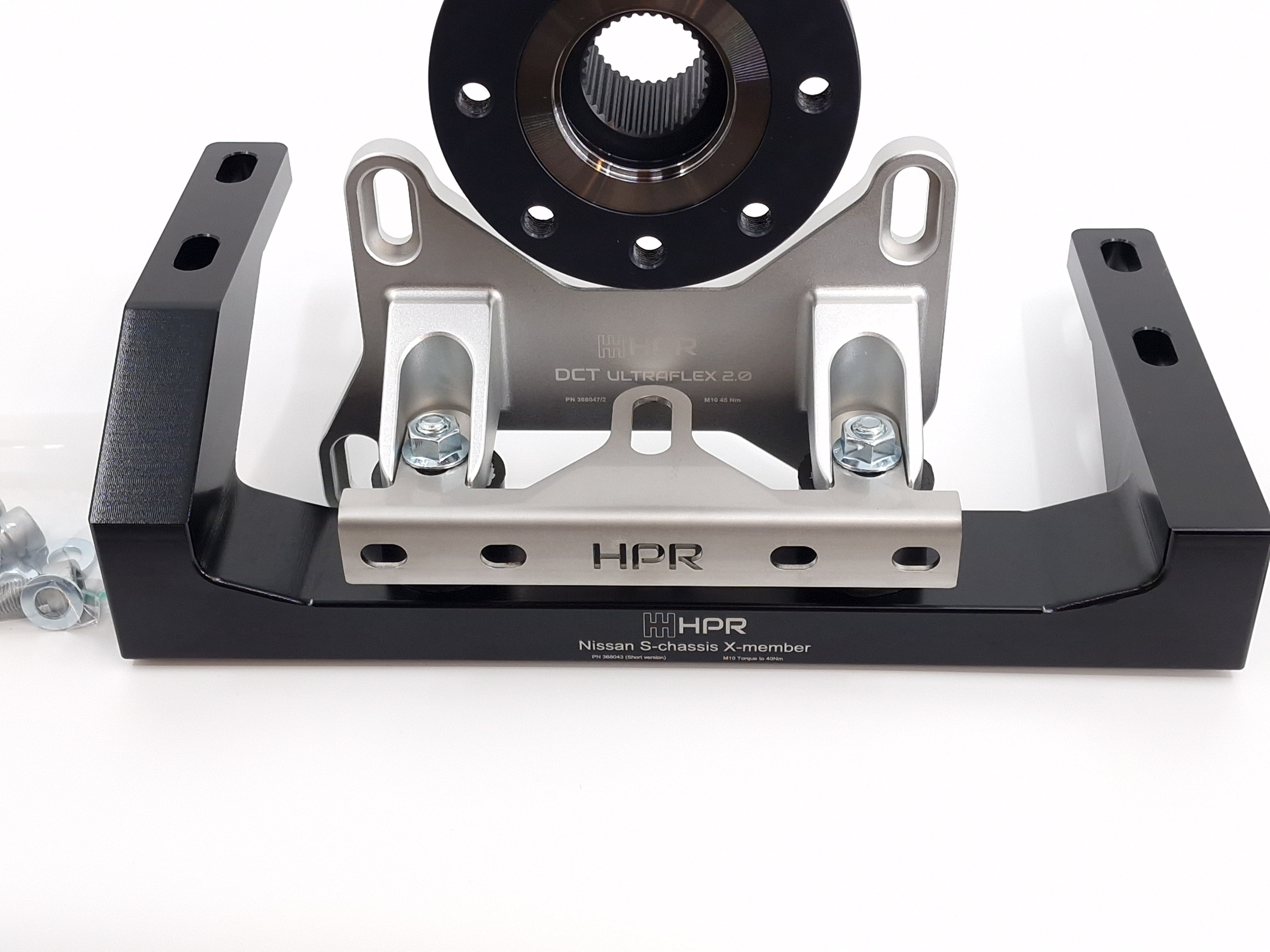 Metal and black mounting bracket with circular hub adapter and bolts