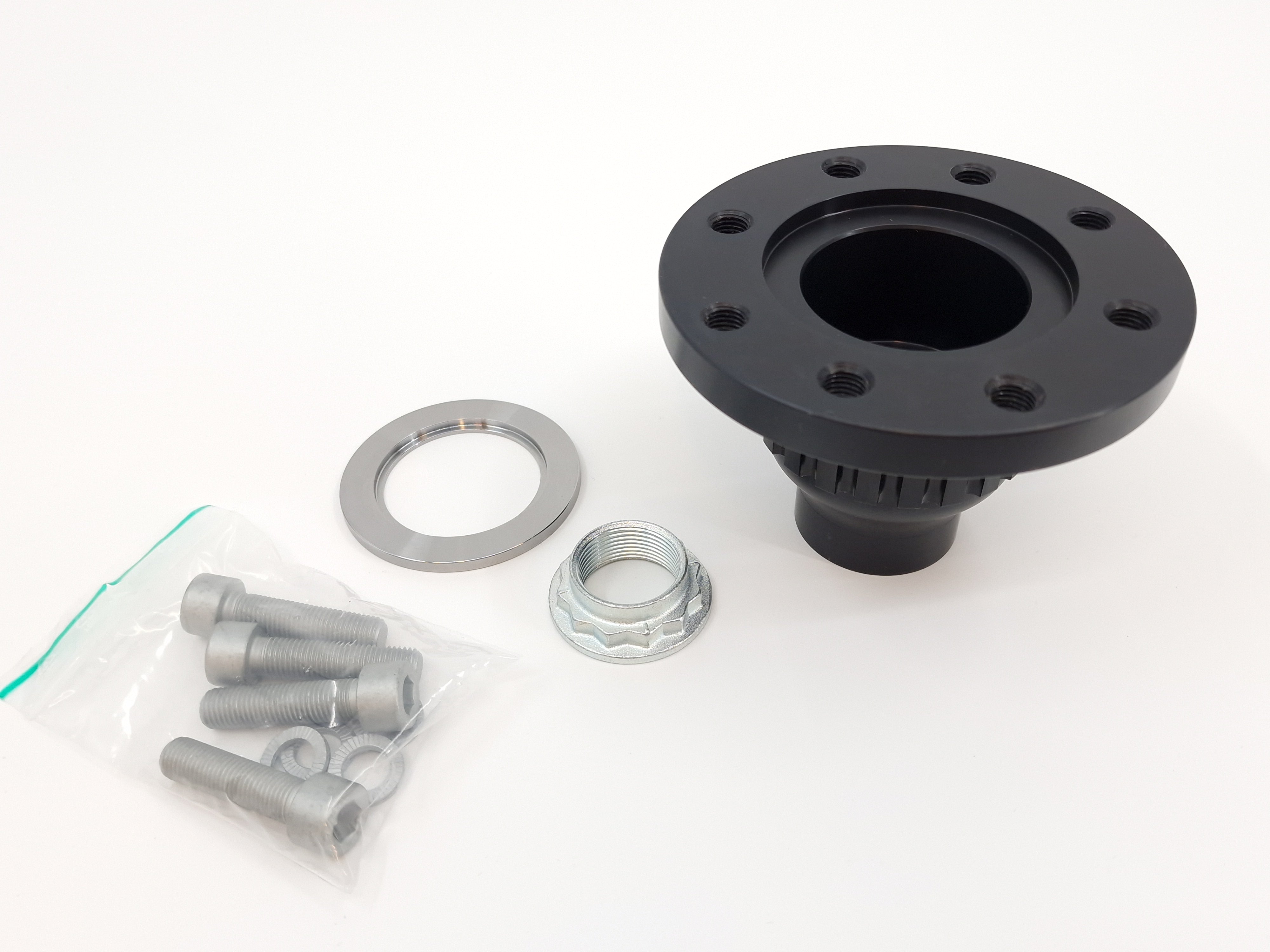 Vehicle kit hub adapter with black flange and included washers and bolts