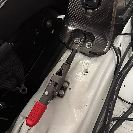 BMW 8HP park-lock kit latch and red pull handle near seat area