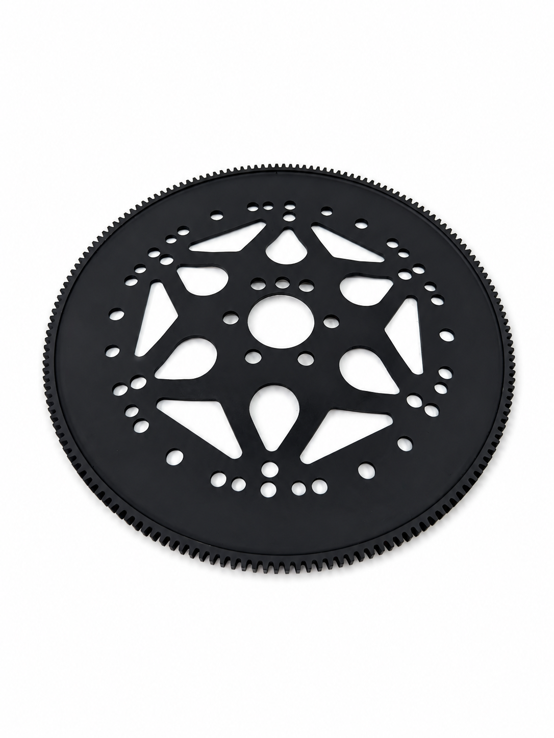Black flexplate with ring gear and cutout pattern, circular bolt holes