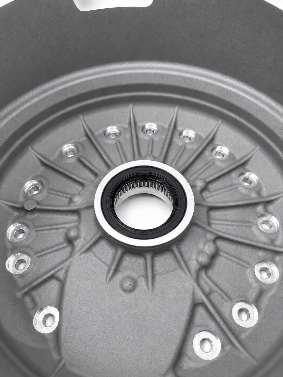 HPR bellhousing close-up of central bearing seal ring on gray metal