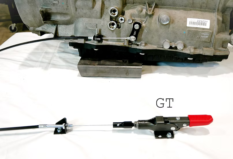GT park-lock kit assembly with long metal rod and red release handle