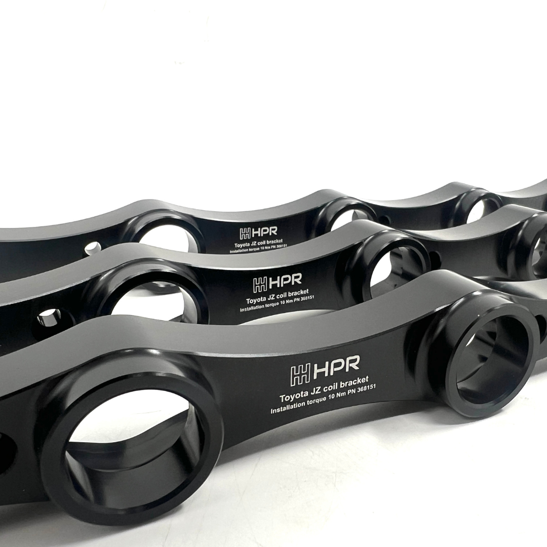 Toyota jz engine coil bracket made out of one piece aluminum, by HPR.