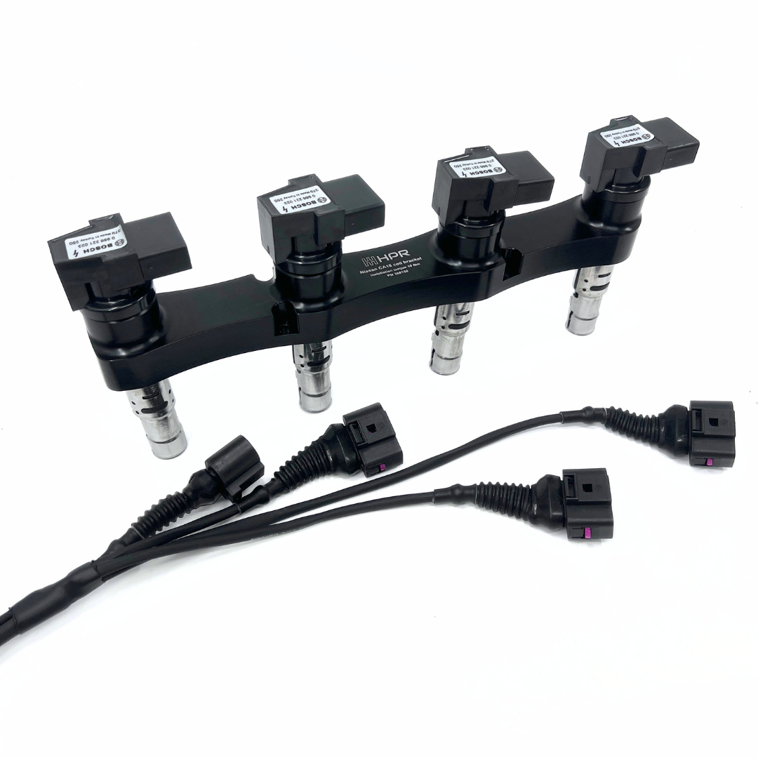 Nissan CA18 coil kit with ignition coils from bosch and wiring harness.