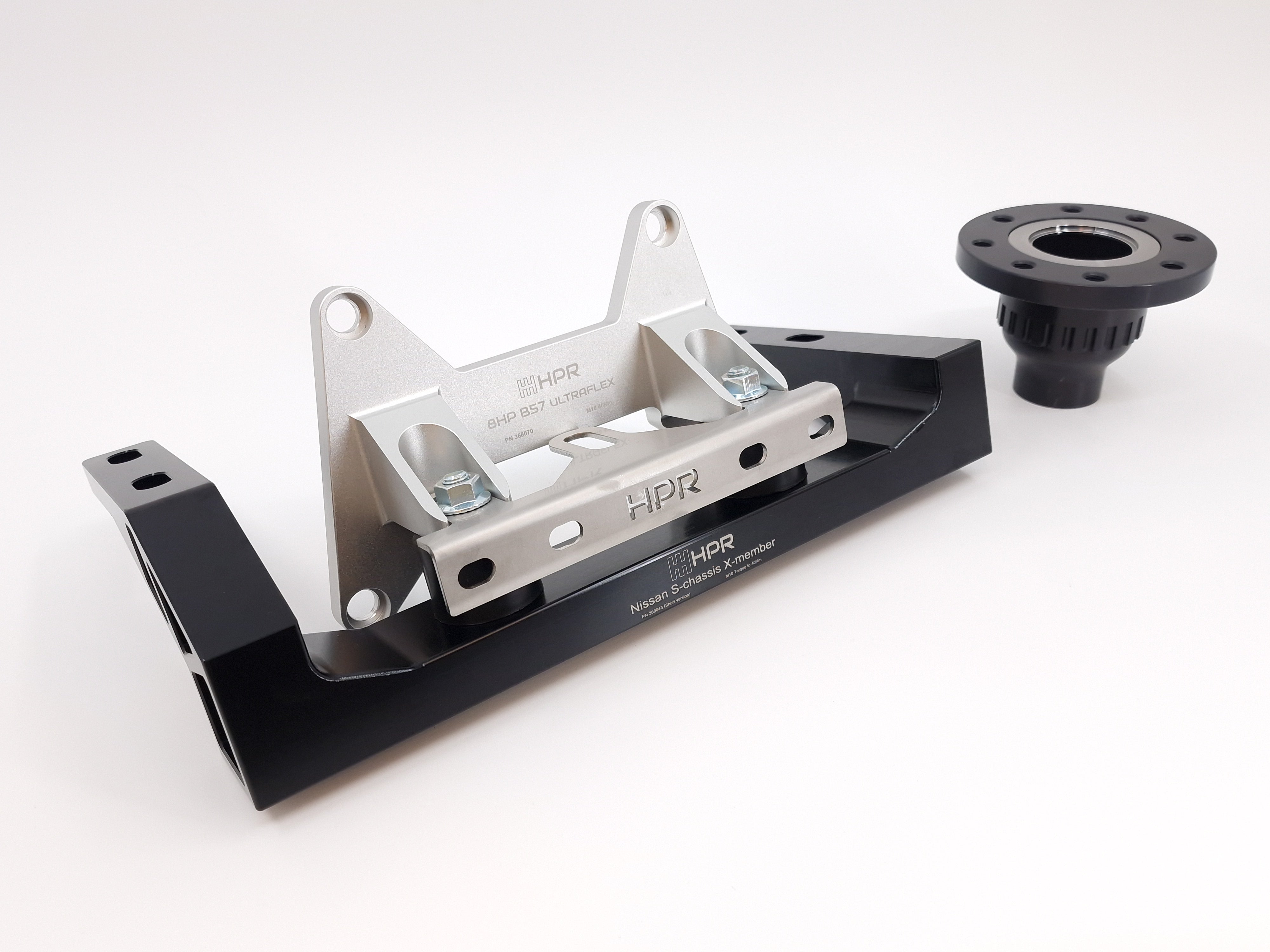 8HP Nissan S chassis conversion kit with rear transmission mount and output flange.