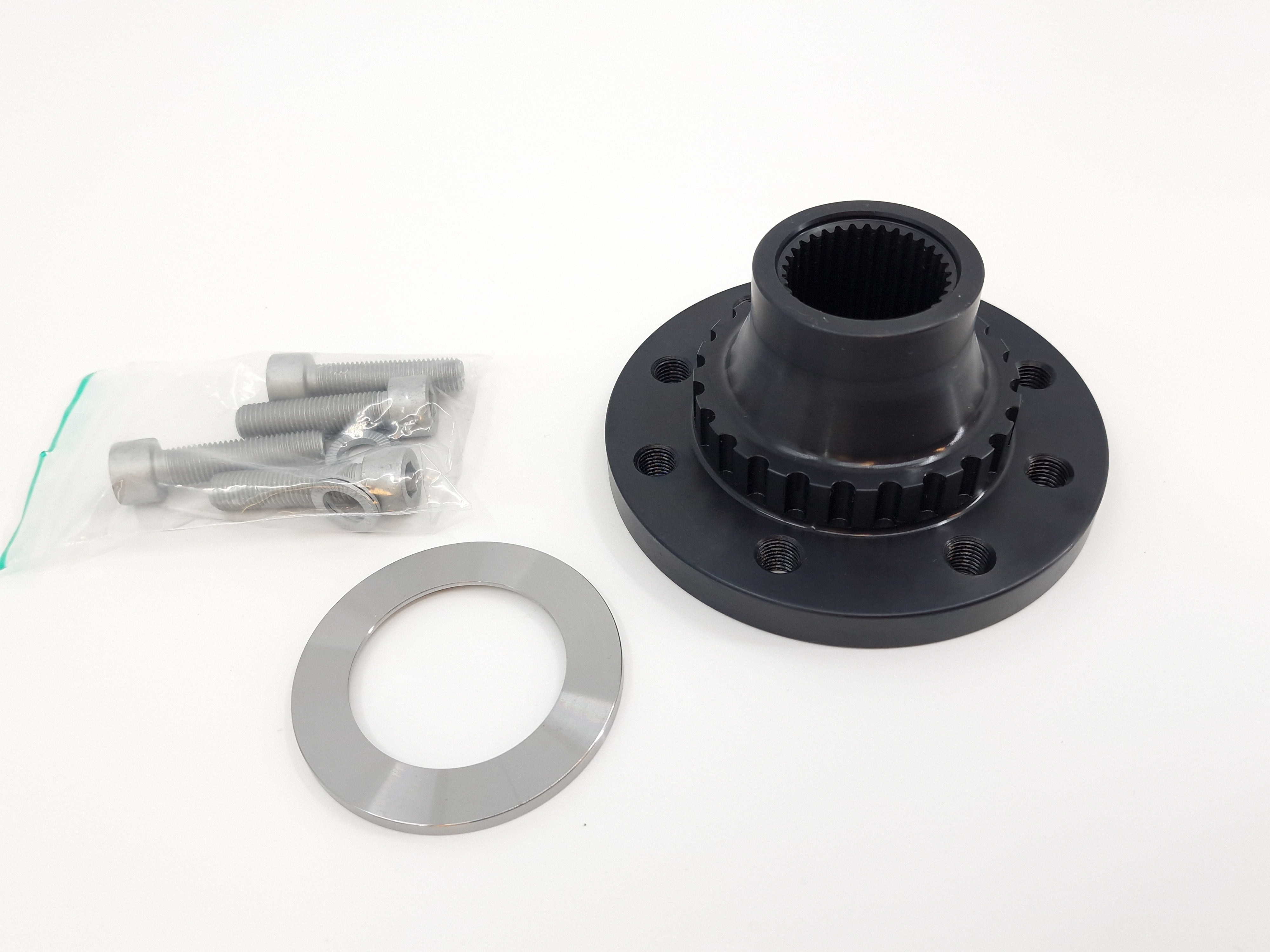 HPR GS7 DCT output flange kit with black flange, spacer ring, and mounting bolts